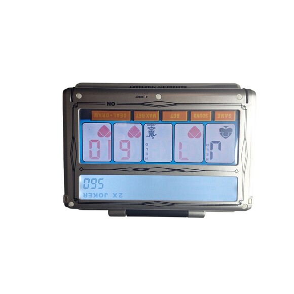 Hammacher Schlemmer Handheld Electronic Video Poker Game with Joker's Wild - Picture 3 of 6